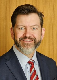 Erik began his service on May 1, 2023, for a term that runs through April 30, 2029. Gov. Kim Reynolds also appointed Helland as Commission Chair through April 30, 2025.
Helland serves on several committees for the National Association of Regulatory Utility Commissioners (NARUC), including the Committee on Critical Infrastructure, NARUC’s Washington Action Program, the Committee on Electricity and the Advanced Nuclear State Collaborative.
He previously worked at the Iowa Public Employment Relations Board and served four years in the Iowa Legislature. He earned a bachelor’s degree in biochemistry and a law degree, both from Drake University.
He and his wife live in Des Moines with their three children. Erik began his service on May 1, 2023, for a term that runs through April 30, 2029. Gov. Kim Reynolds also appointed Helland as Commission Chair through April 30, 2025.
Helland serves on several committees for the National Association of Regulatory Utility Commissioners (NARUC), including the Committee on Critical Infrastructure, NARUC’s Washington Action Program, the Committee on Electricity and the Advanced Nuclear State Collaborative.
He previously worked at the Iowa Public Employment Relations Board and served four years in the Iowa Legislature. He earned a bachelor’s degree in biochemistry and a law degree, both from Drake University.
He and his wife live in Des Moines with their three children.